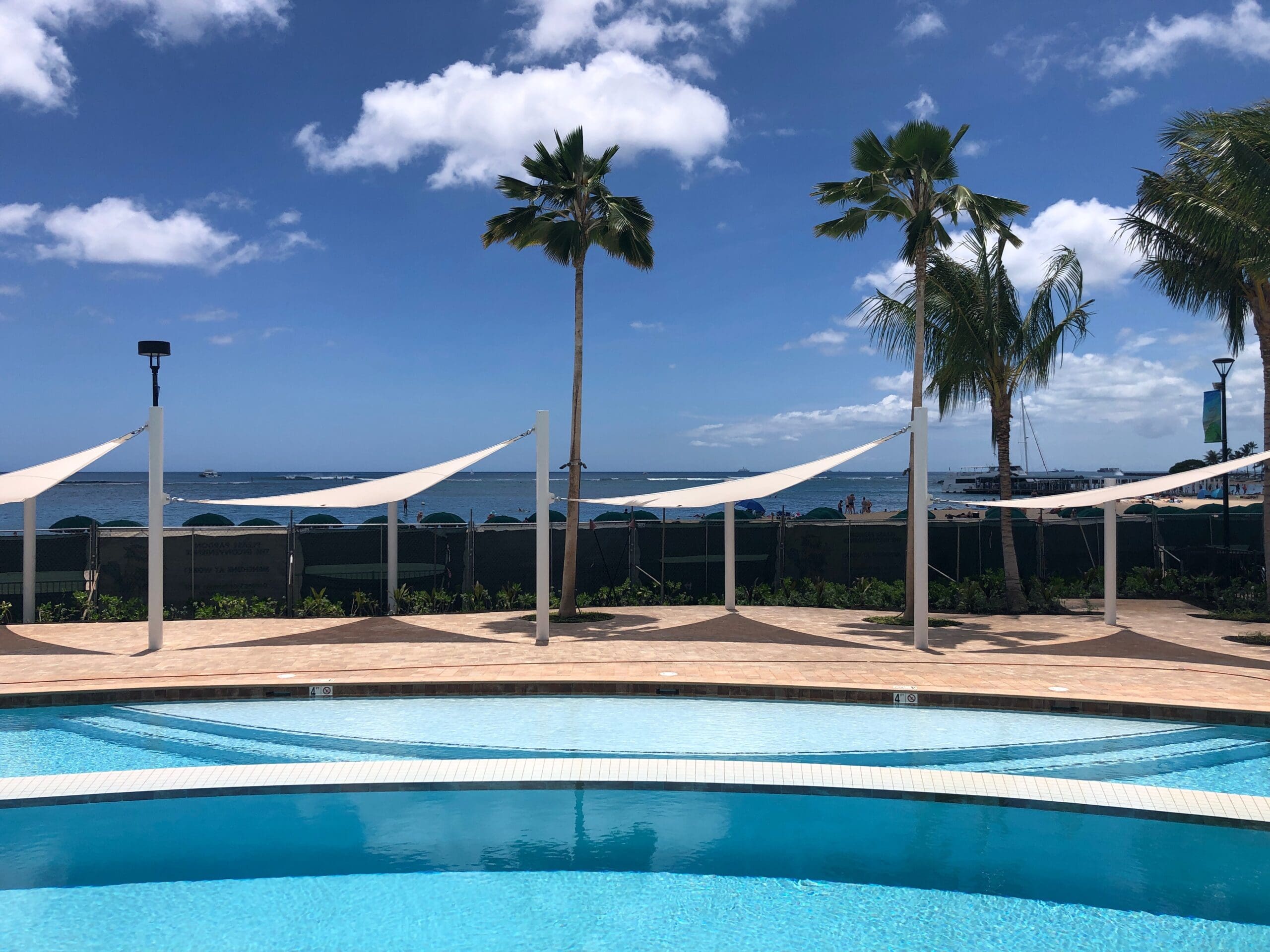 Sun shade sail canopy next to pool at Hale Koa Hotel in Honolulu
