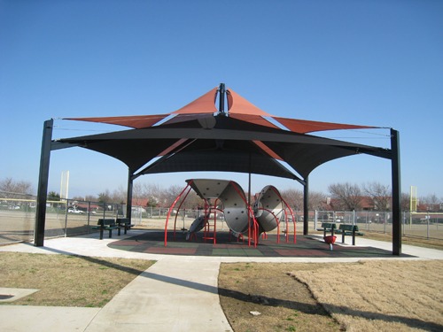 Multi-level playground equipment shade structure at Enfield Park