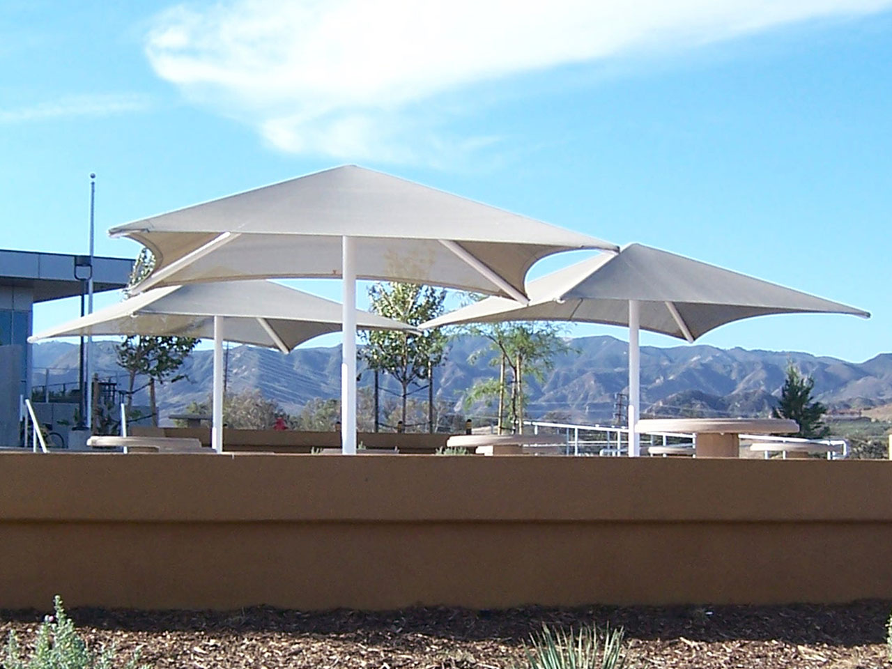 white shades with blue sky